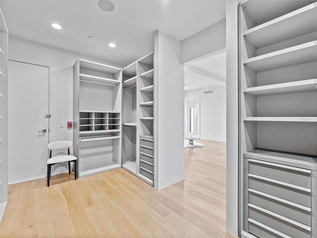465 Central Avenue, Unit 301 St. Petersburg, FL 33701 - Photo 20 of 47 a view of wooden floor and windows in a room