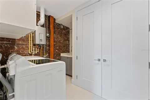 a room with dryer and washer