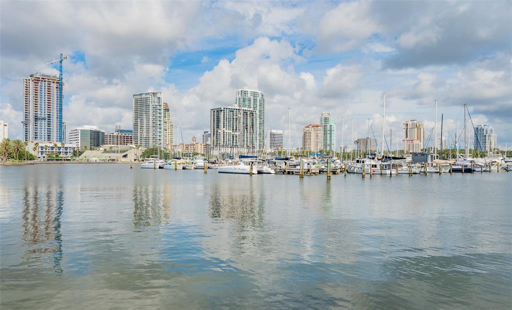 465 Central Avenue, Unit 301 St. Petersburg, FL 33701 - Photo 38 of 47 a view of a ocean with boats next to both of building