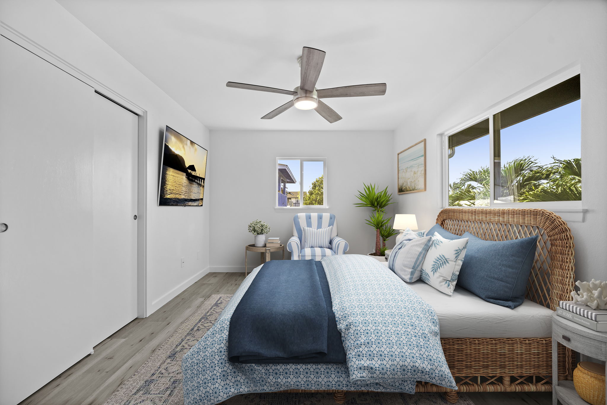 4431 Iona Road Hanapepe, HI 96705 - Photo 15 of 20 a bedroom with a bed wooden floor and window
