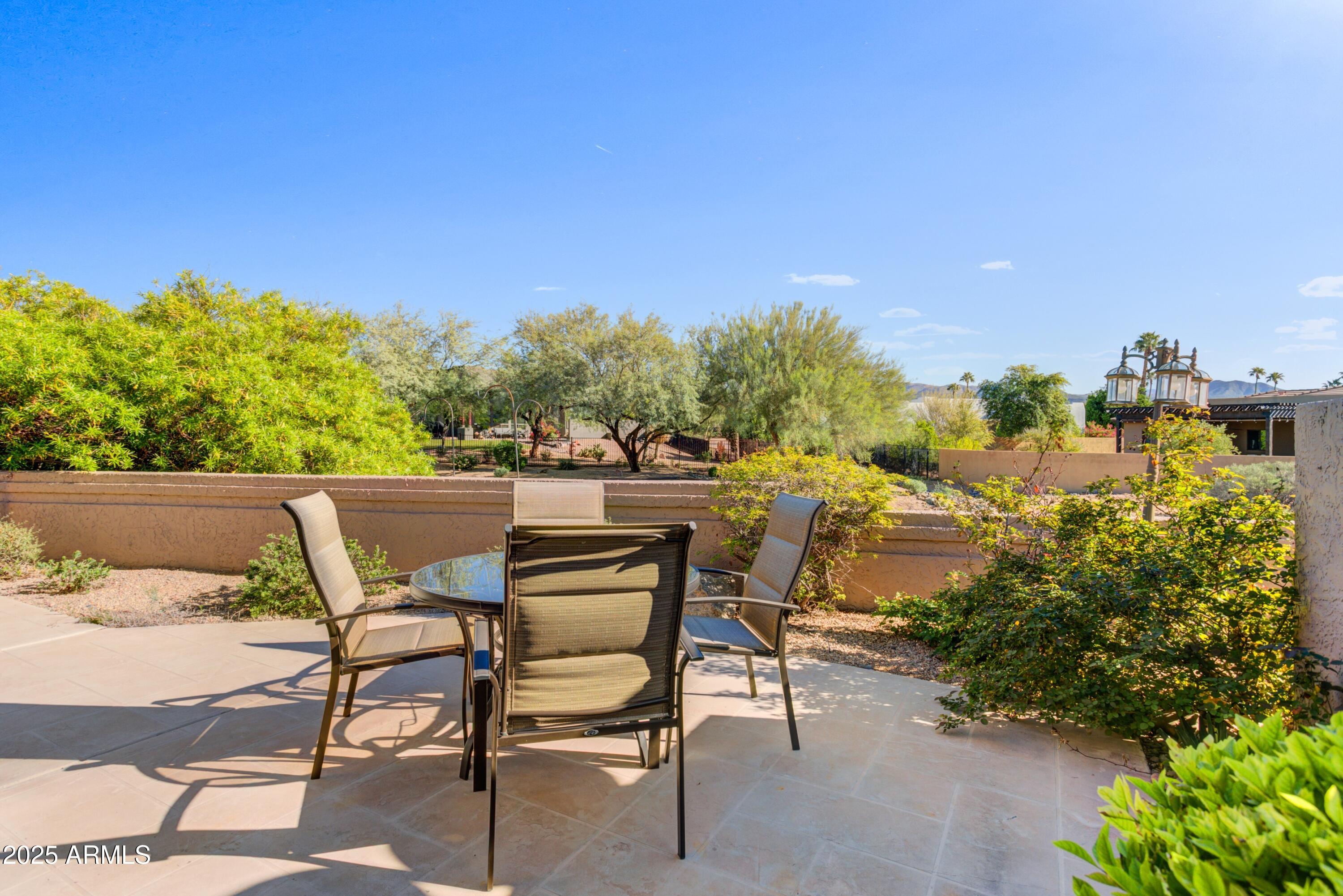25609 Forest Road, Unit 7 Rio Verde, AZ 85263 - Photo 13 of 21 a view of a chairs and table in the patio