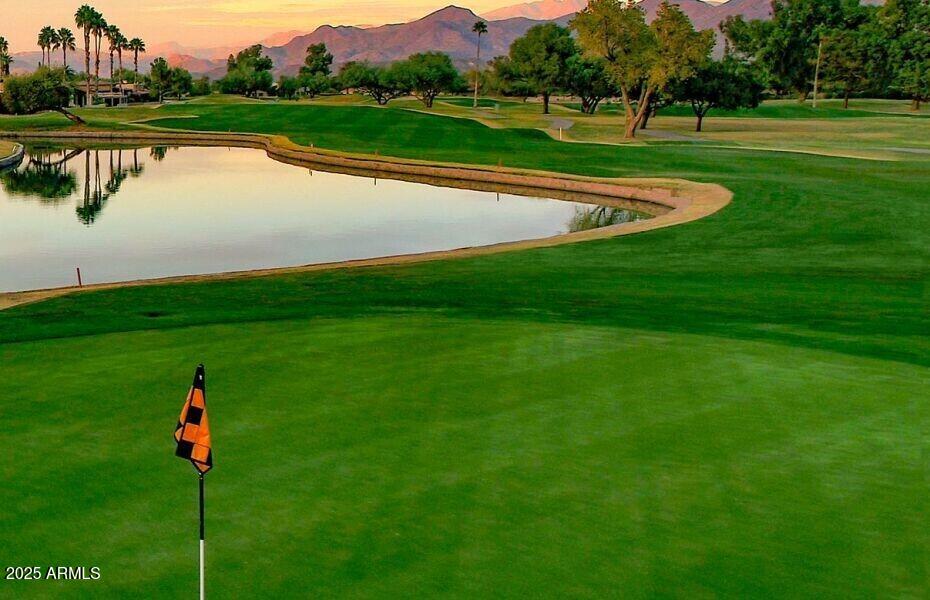 25609 Forest Road, Unit 7 Rio Verde, AZ 85263 - Photo 15 of 21 a view of a golf course with a lake