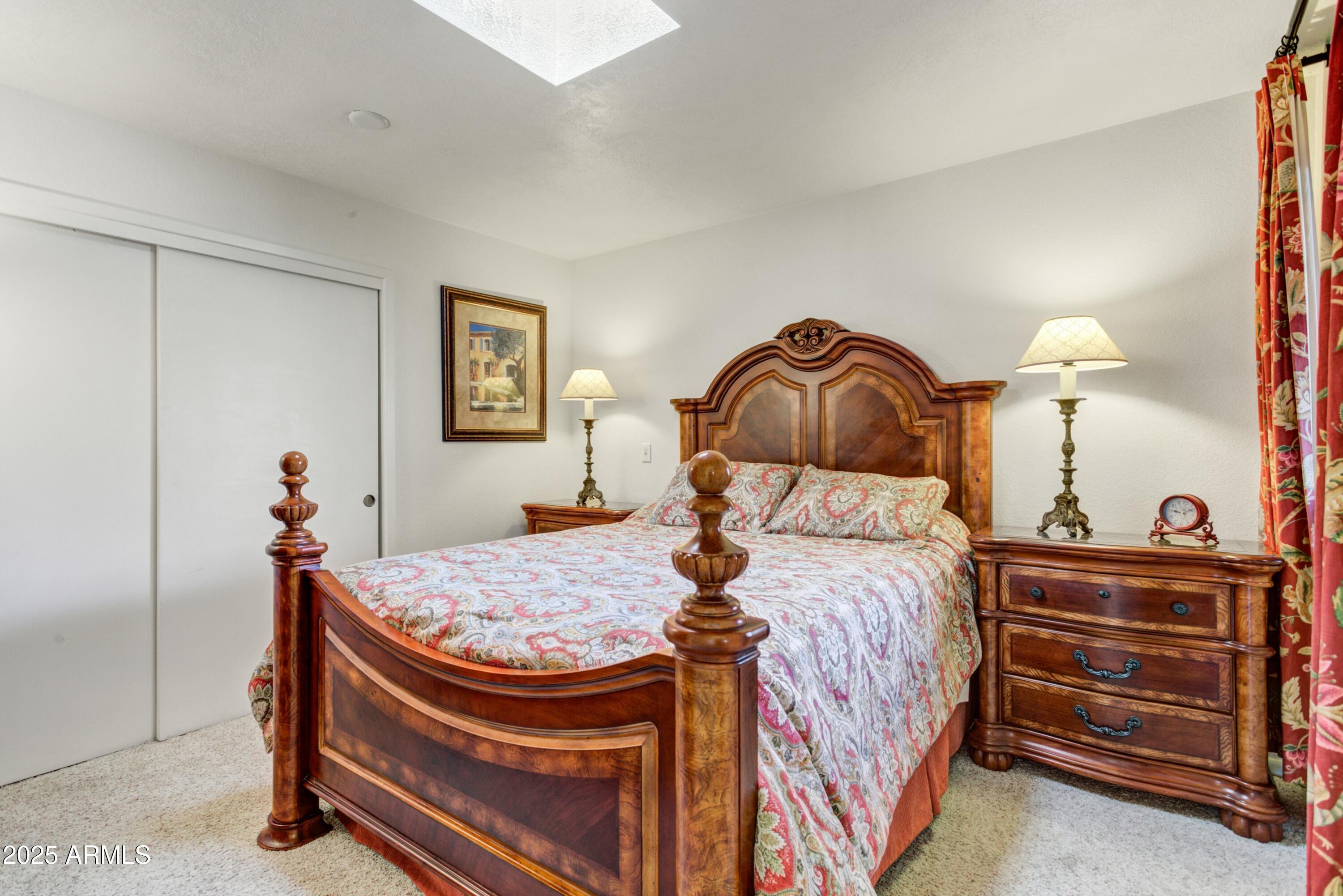 25609 Forest Road, Unit 7 Rio Verde, AZ 85263 - Photo 10 of 21 a bed room with a bed and a lamp