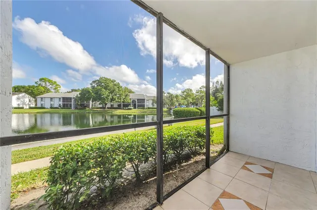 a view of a black and white floor to ceiling window