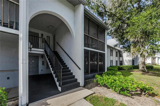 a view of a lake with a garden