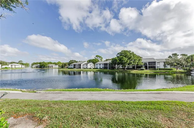 a view of swimming pool with chairs