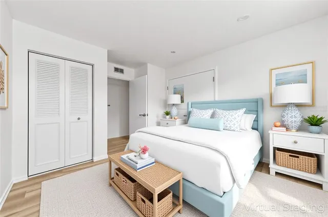 a bedroom with bed and a window