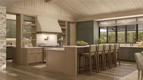 a open kitchen with a table and chairs
