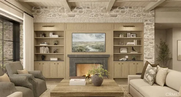 a living room with furniture a window and a fireplace