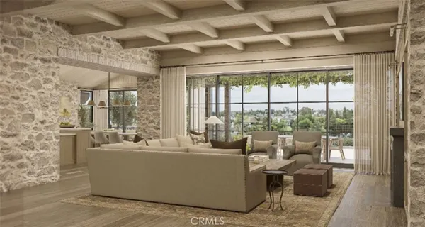 a living room with furniture and a floor to ceiling window