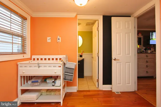 a view of room with closet and windows