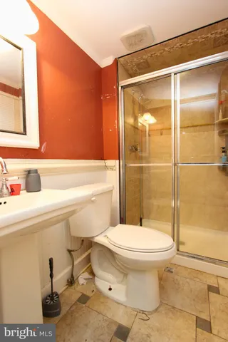 a bathroom with a sink and a toilet