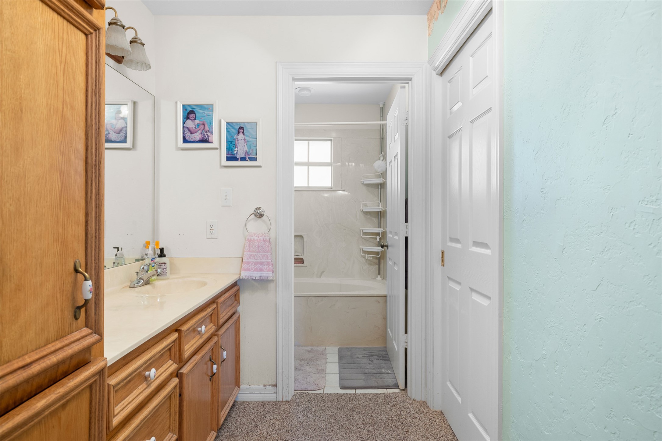 4231 Johnston Road Wallis, TX 77485 - Photo 19 of 43 a bathroom with a sink and a mirror