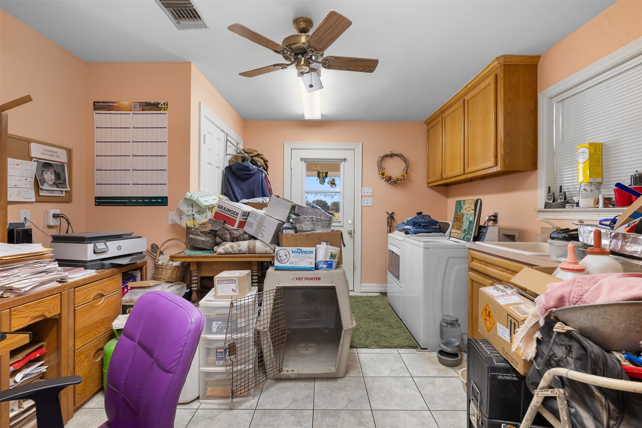 4231 Johnston Road Wallis, TX 77485 - Photo 22 of 43 a kitchen with stainless steel appliances granite countertop sink stove top oven and cabinets