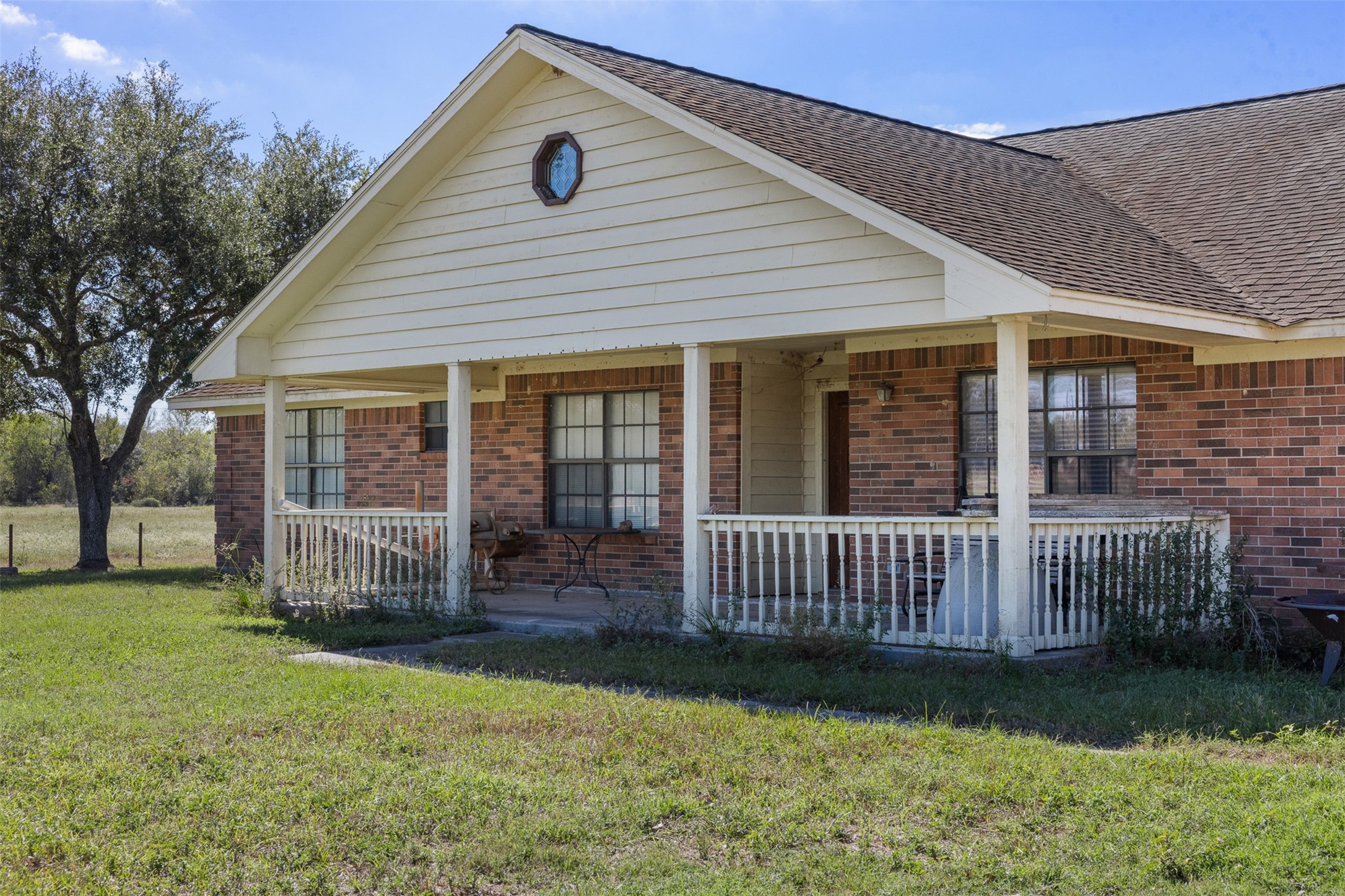 4231 Johnston Road Wallis, TX 77485 - Photo 3 of 43 a front view of a house with a yard
