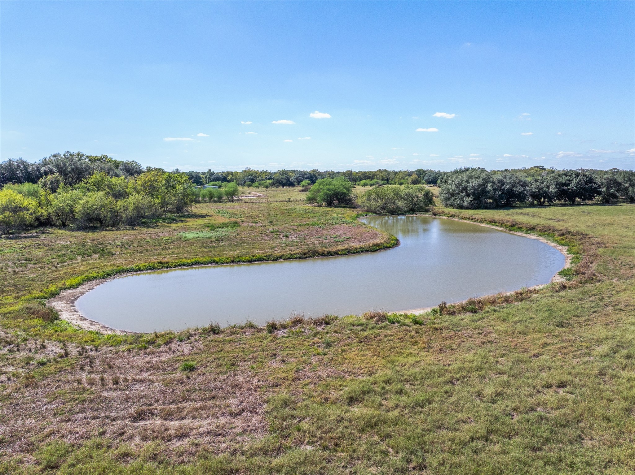 4231 Johnston Road Wallis, TX 77485 - Photo 36 of 43 a view of a lake with outdoor space