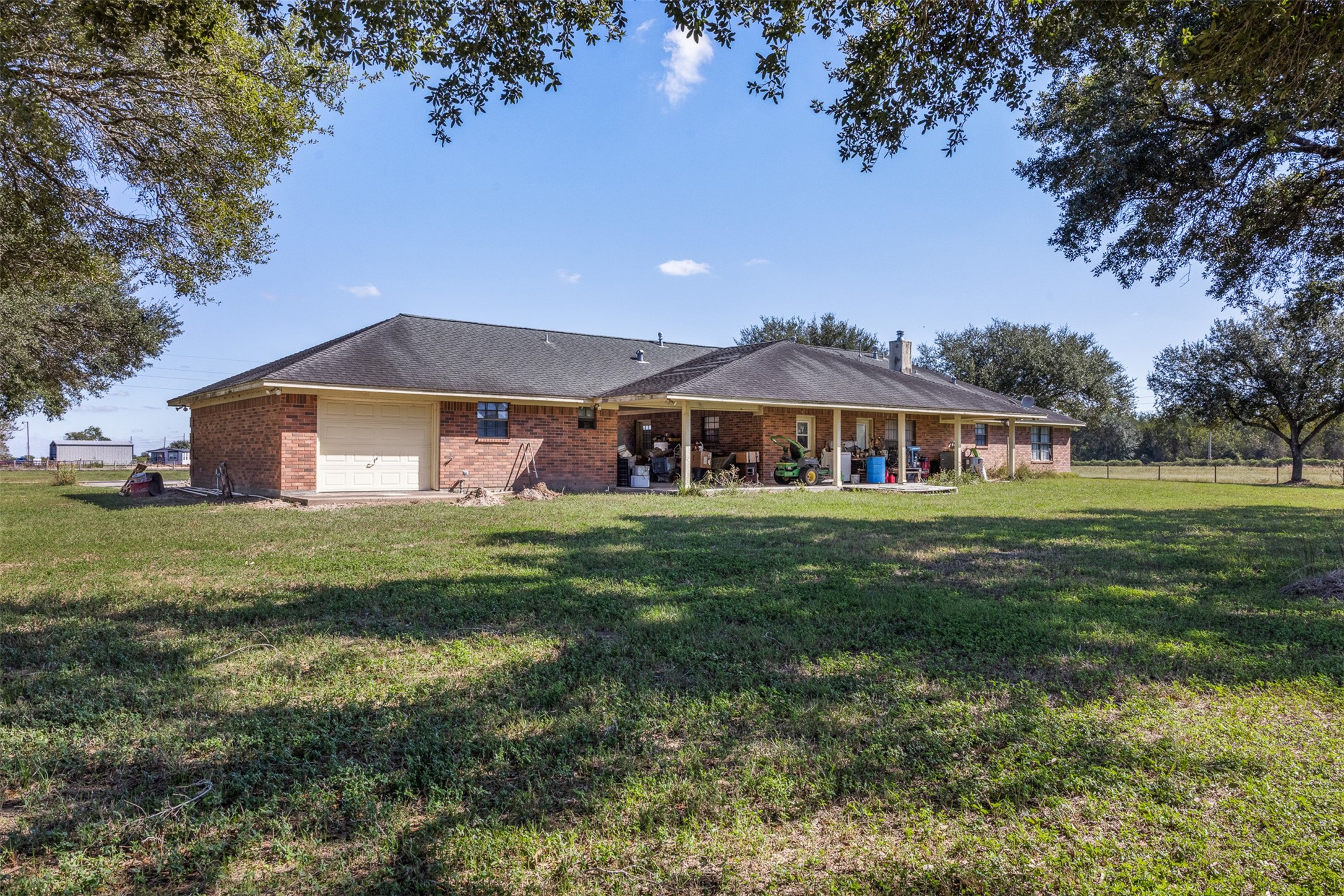 4231 Johnston Road Wallis, TX 77485 - Photo 6 of 43 a front view of house with yard and green space
