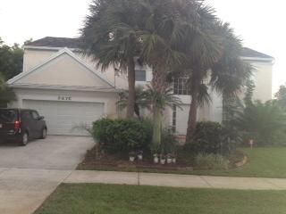 3870 Sabal Lakes Road Delray Beach, FL 33445 - Photo 2 of 17 a view of a house with a yard