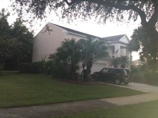 3870 Sabal Lakes Road Delray Beach, FL 33445 - Photo 3 of 17 a view of a back yard of the house