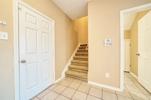 a view of an entryway with staircase