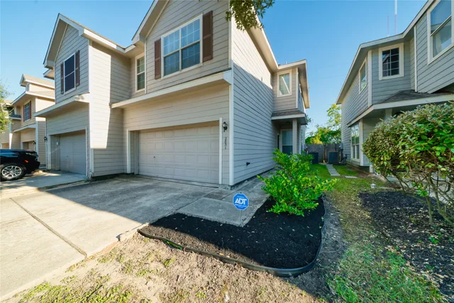 a view of a back yard of the house