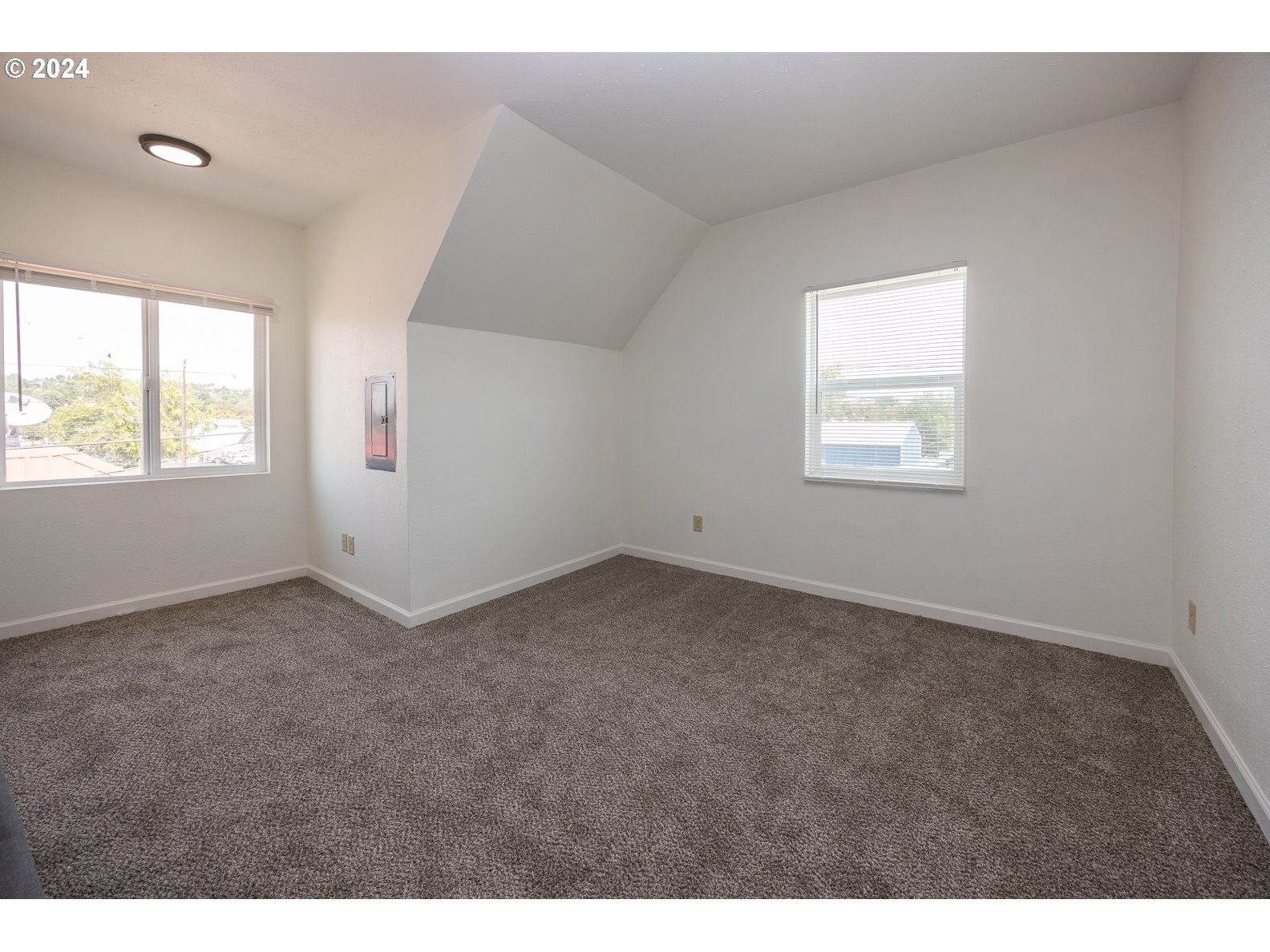 415 Southwest 7th Street Pendleton, OR 97801 - Photo 14 of 40 a view of an empty room with a window