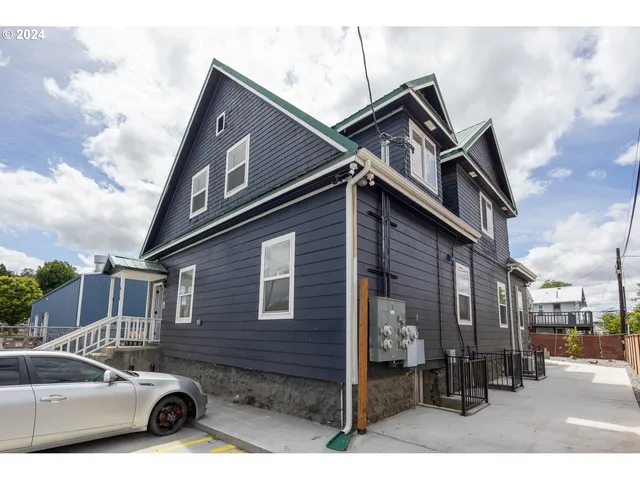 a car parked in front of a house