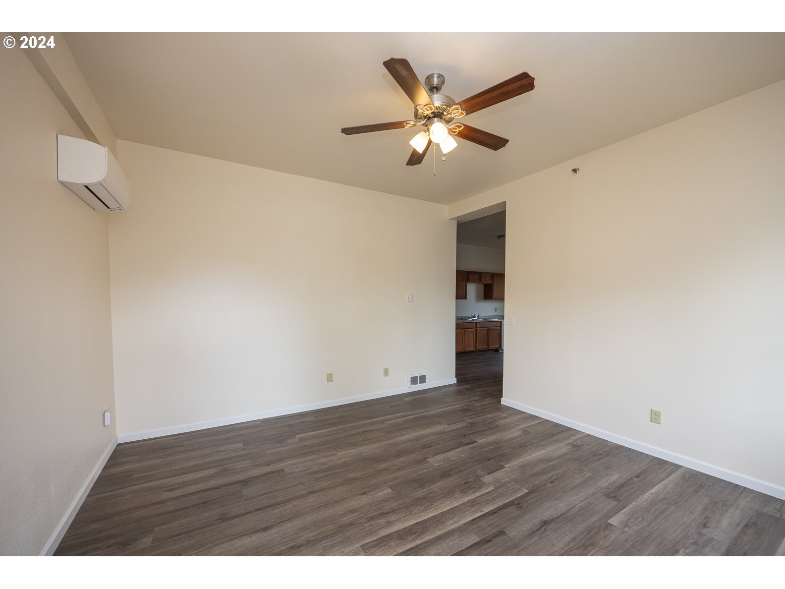 415 Southwest 7th Street Pendleton, OR 97801 - Photo 23 of 40 a view of an empty room with wooden floor