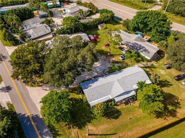 an aerial view of residential house with outdoor space