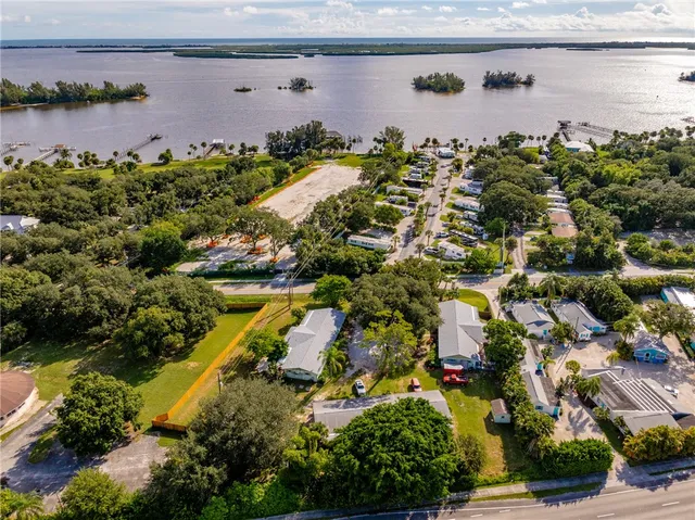 a picture of houses with lake view