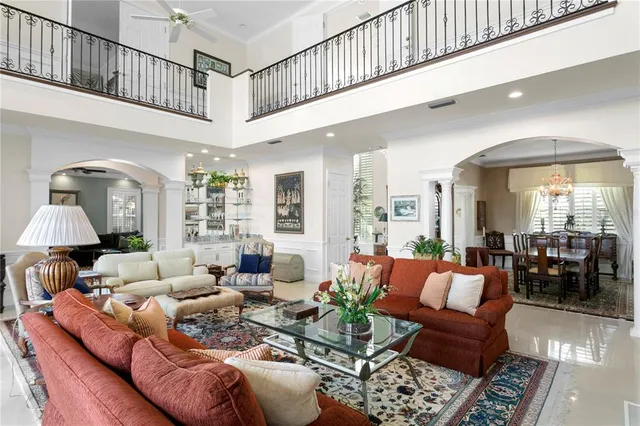 a view of a dining room with furniture and window