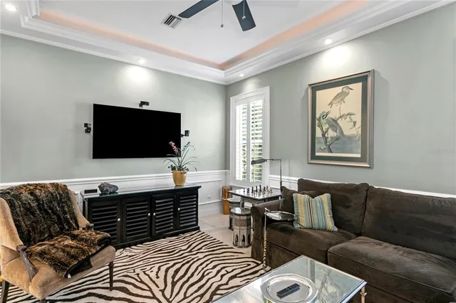 a kitchen with stainless steel appliances granite countertop a sink a stove and a wooden cabinets