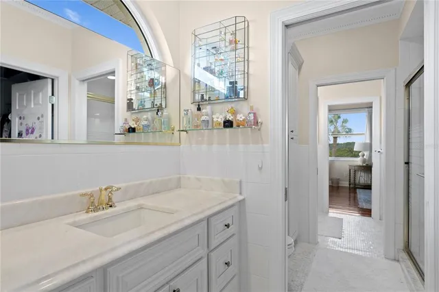 a kitchen with stainless steel appliances granite countertop a sink and a stove