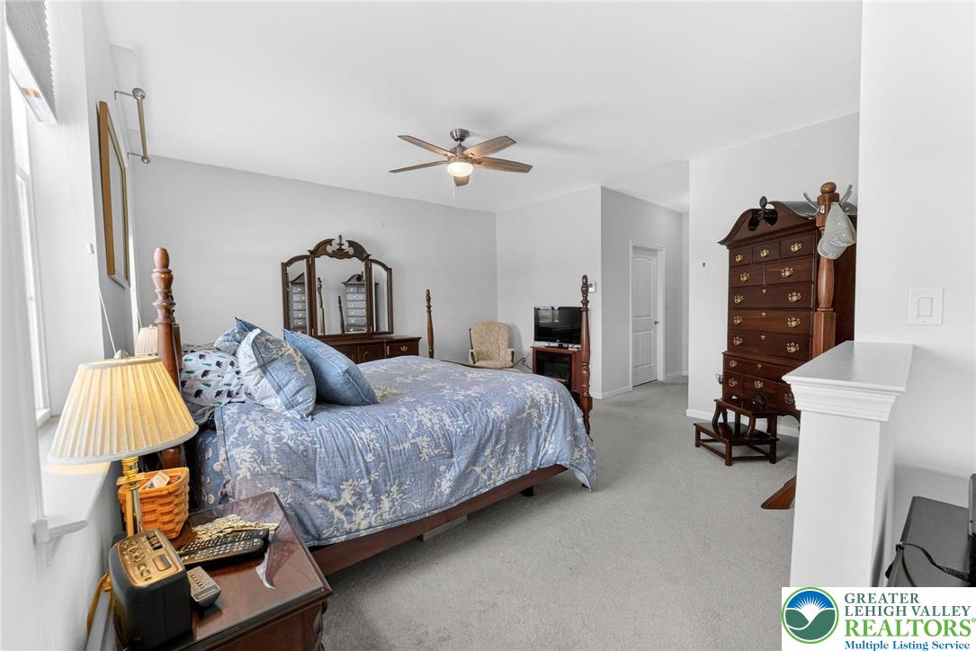 3465 Treeview Drive Emmaus, PA 18049 - Photo 21 of 38 a bedroom with a bed furniture and window