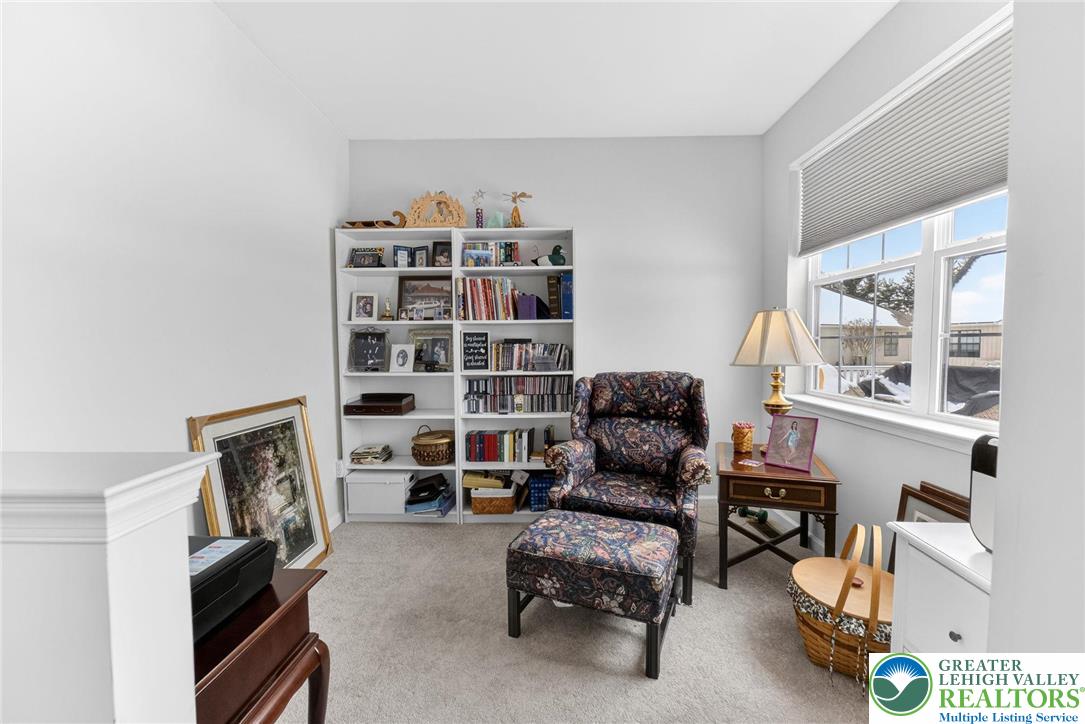 3465 Treeview Drive Emmaus, PA 18049 - Photo 22 of 38 a living room with furniture cabinets and a window