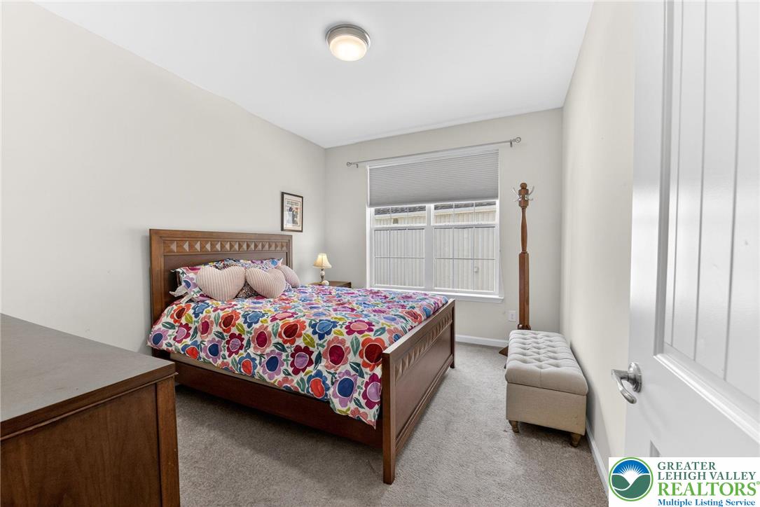 3465 Treeview Drive Emmaus, PA 18049 - Photo 26 of 38 a bedroom with a bed and a couch