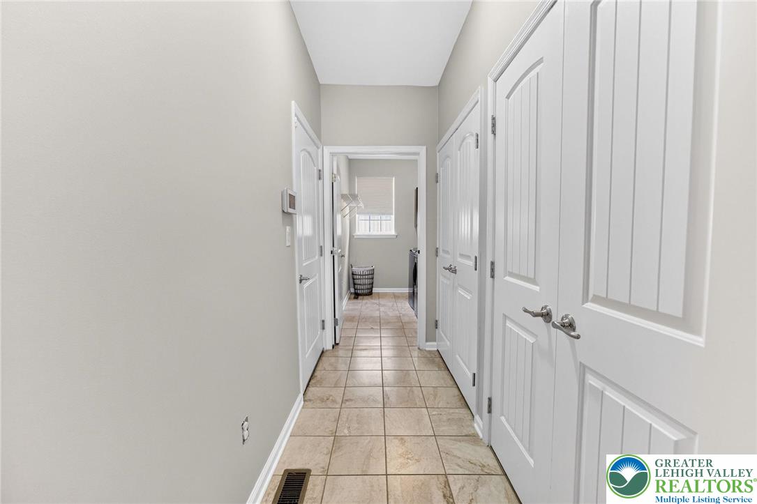 3465 Treeview Drive Emmaus, PA 18049 - Photo 30 of 38 a view of a hallway with a white walls