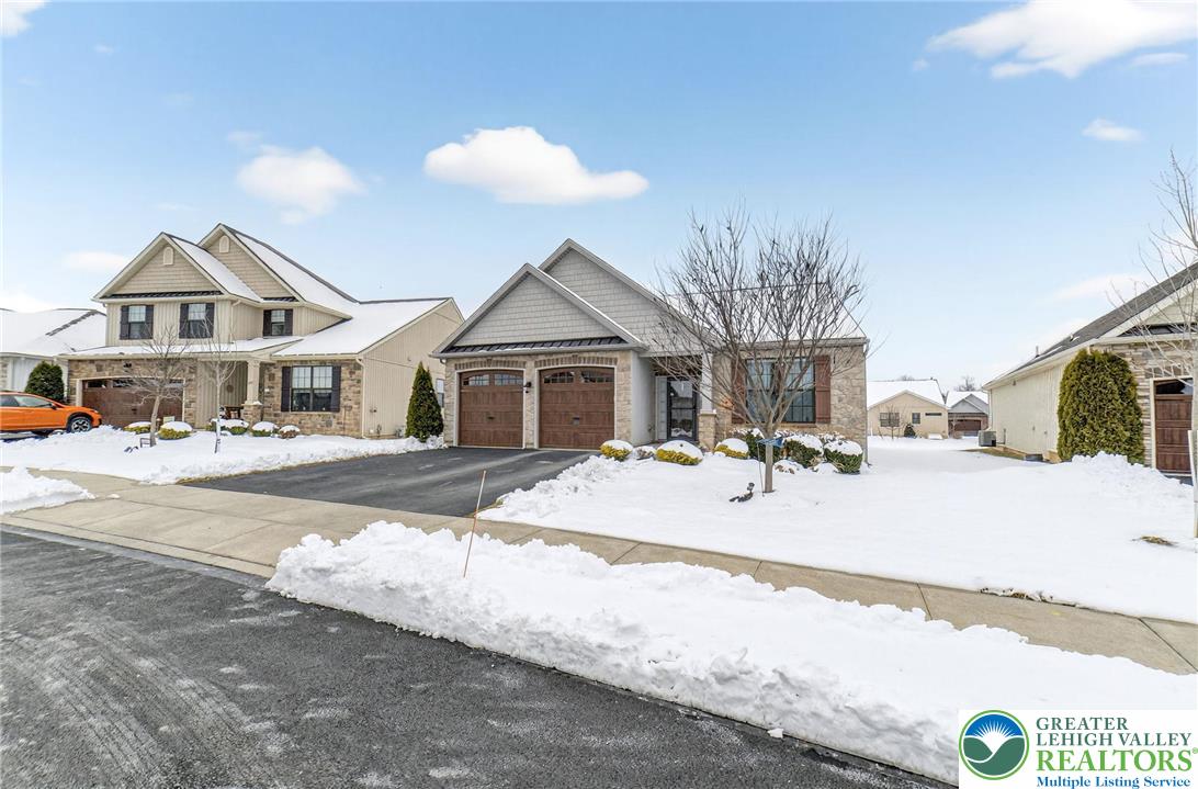 3465 Treeview Drive Emmaus, PA 18049 - Photo 35 of 38 a view of a house with snow on the road
