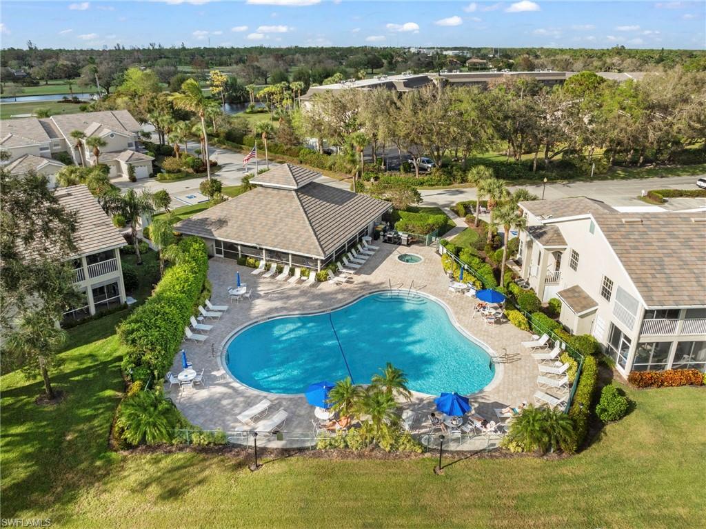 13120 Castle Harbour Drive, Unit N4 Naples, FL 34110 - Photo 30 of 36 an aerial view of residential houses with outdoor space