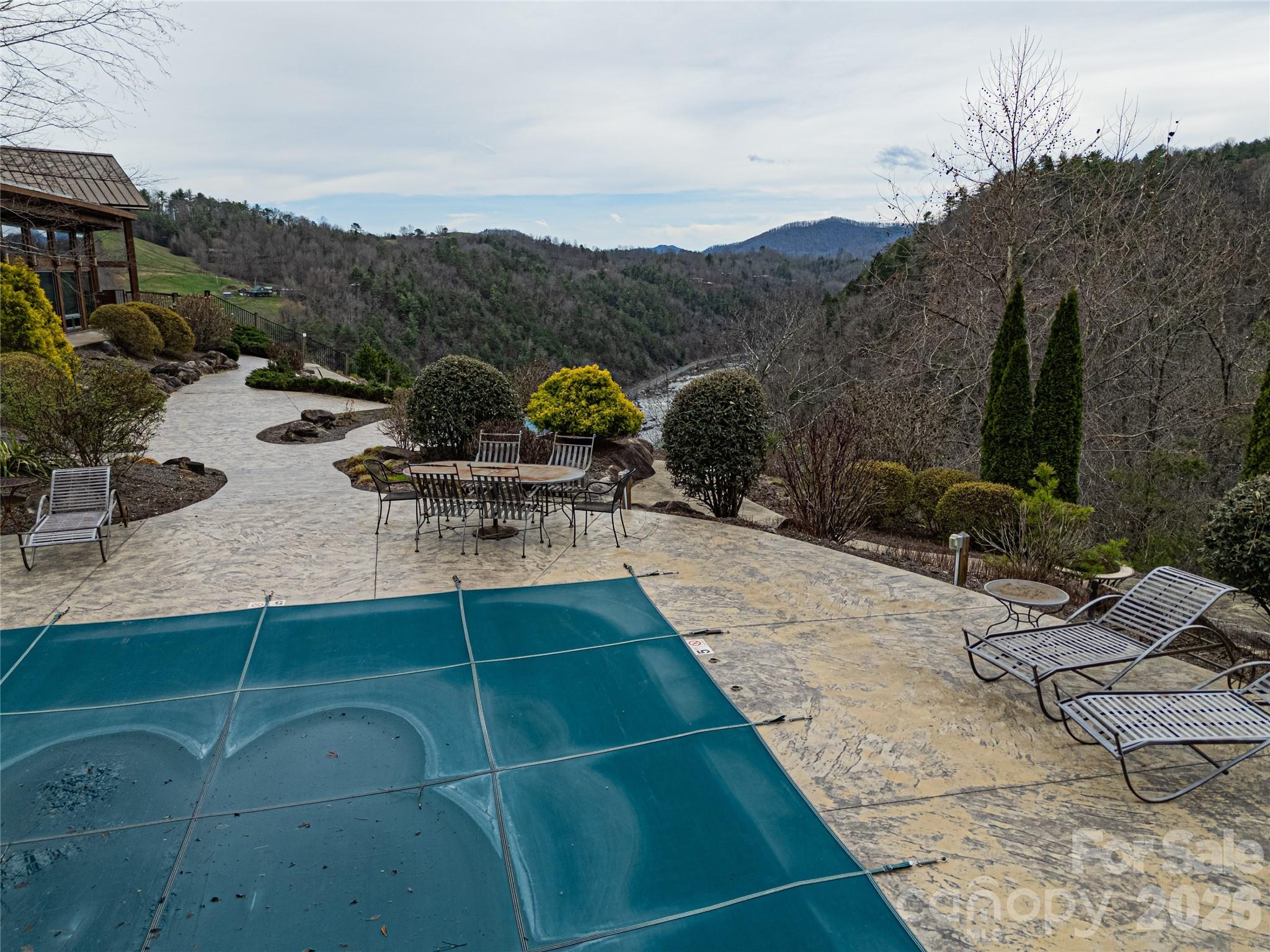 51 Wild Turkey Loop, Unit 32 Marshall, NC 28753 - Photo 26 of 37 a view of a backyard with sitting area