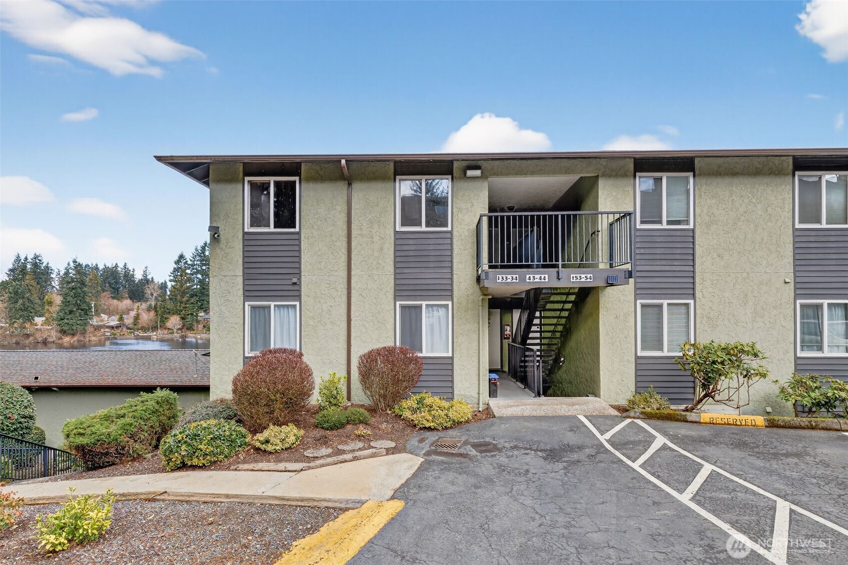 615 75th Street Southeast, Unit C53 Everett, WA 98203 - Photo 1 of 20 a front view of a house with garden