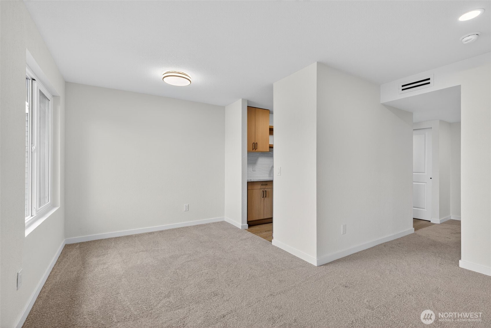 615 75th Street Southeast, Unit C53 Everett, WA 98203 - Photo 11 of 20 a view of an empty room and a window