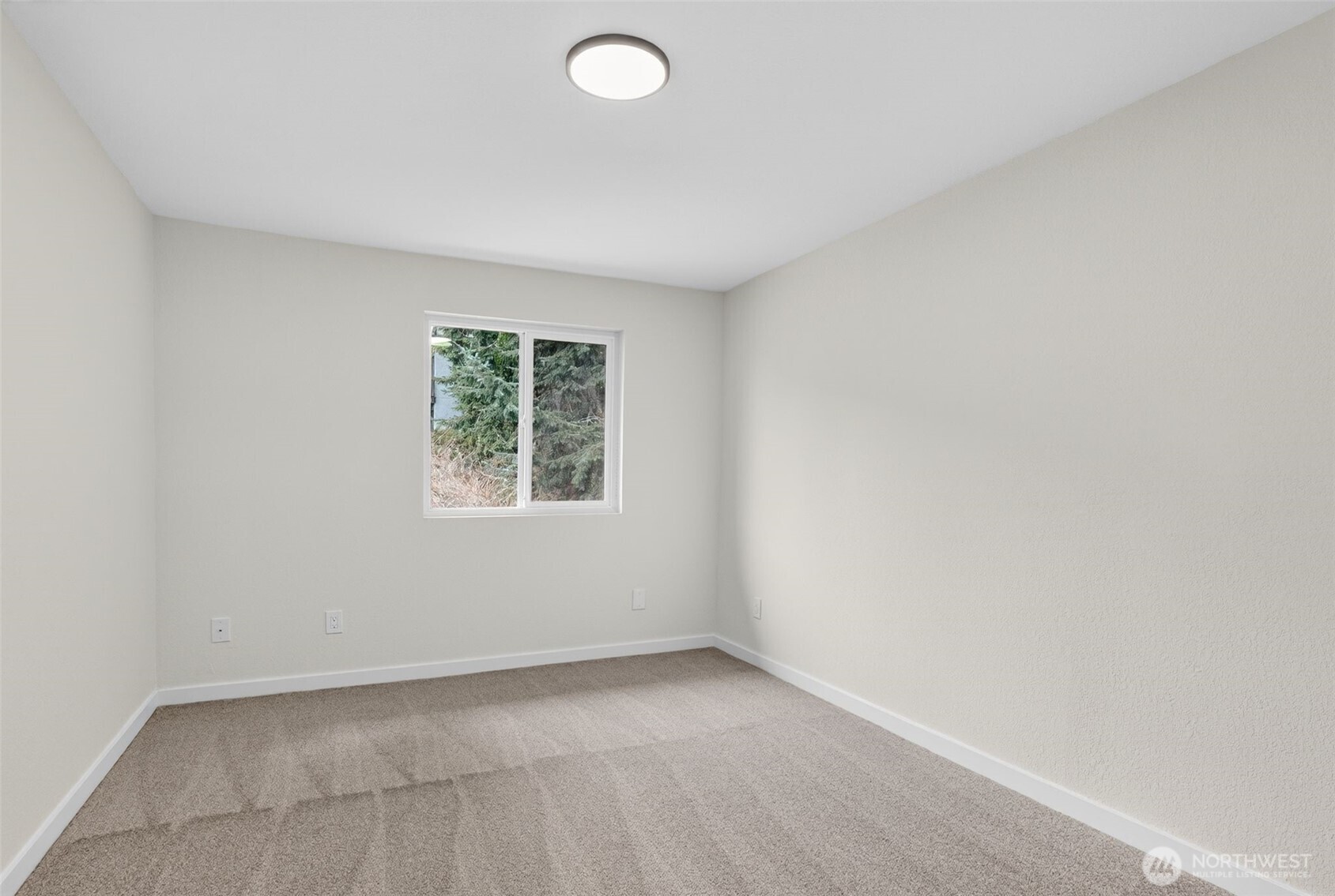 615 75th Street Southeast, Unit C53 Everett, WA 98203 - Photo 18 of 20 an empty room with a window