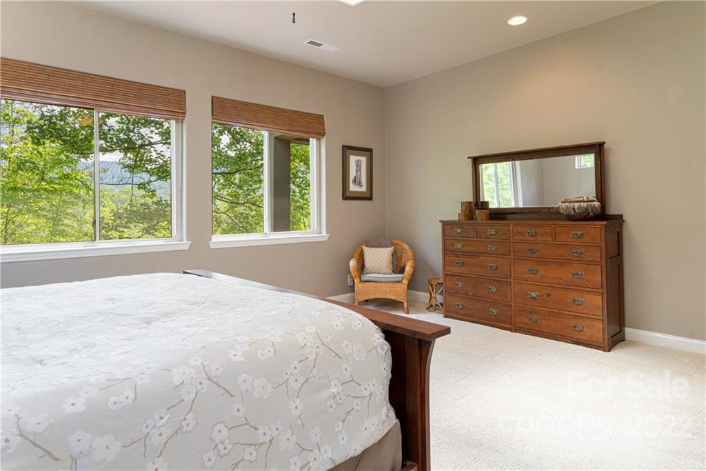 2391 Paint Fork Road Mars Hill, NC 28754 - Photo 24 of 45 a bed room with a bed and a window