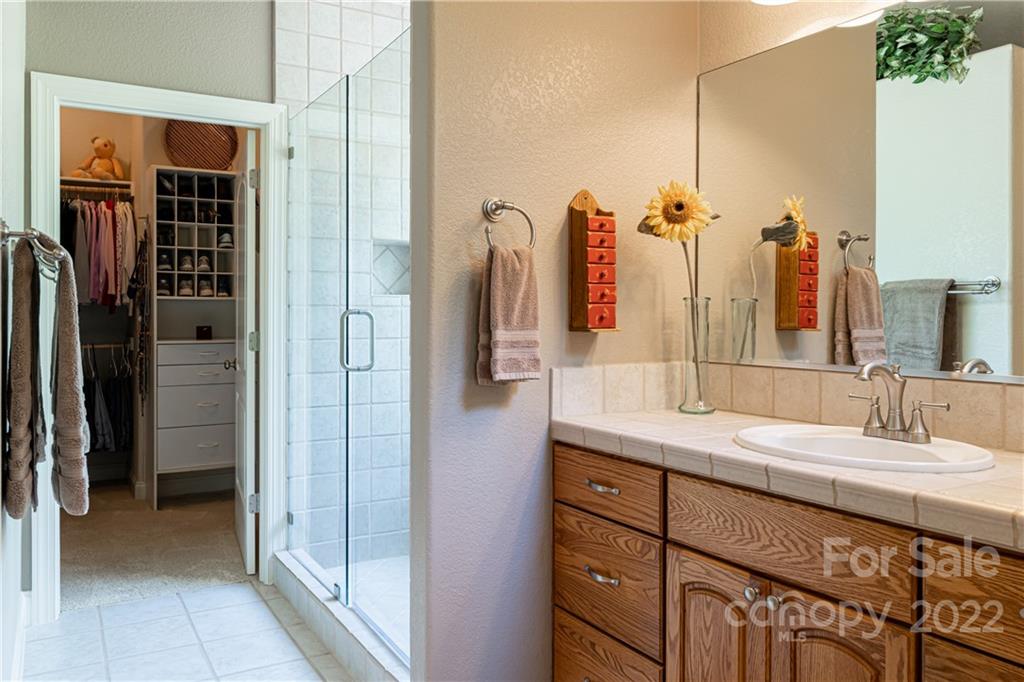 2391 Paint Fork Road Mars Hill, NC 28754 - Photo 25 of 45 a bathroom with a sink and a mirror