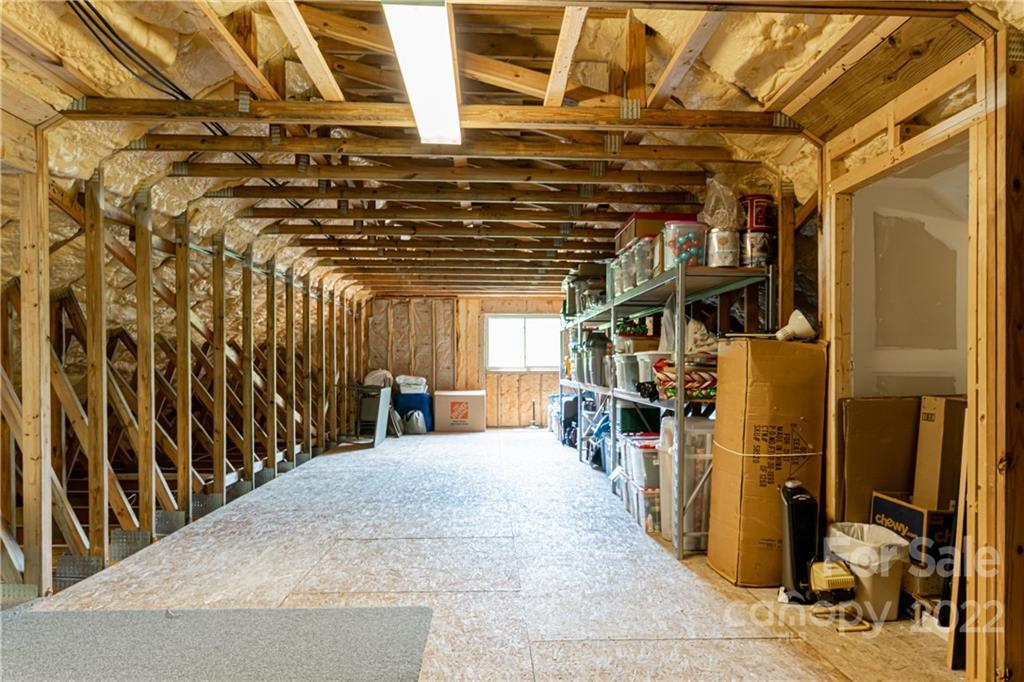 2391 Paint Fork Road Mars Hill, NC 28754 - Photo 33 of 45 a view of an empty room with wooden floor