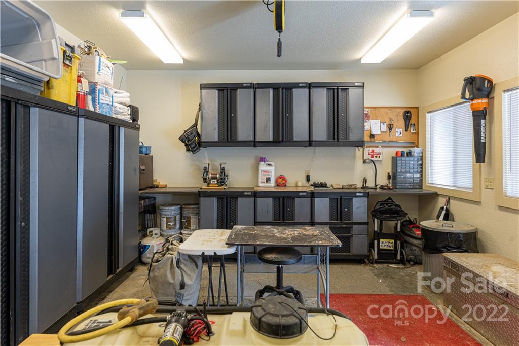 2391 Paint Fork Road Mars Hill, NC 28754 - Photo 35 of 45 a kitchen with a refrigerator and a stove
