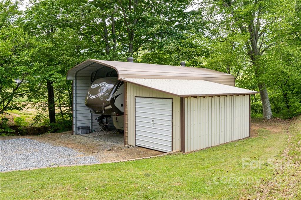 2391 Paint Fork Road Mars Hill, NC 28754 - Photo 44 of 45 a view of backyard with barbeque grill and stairs