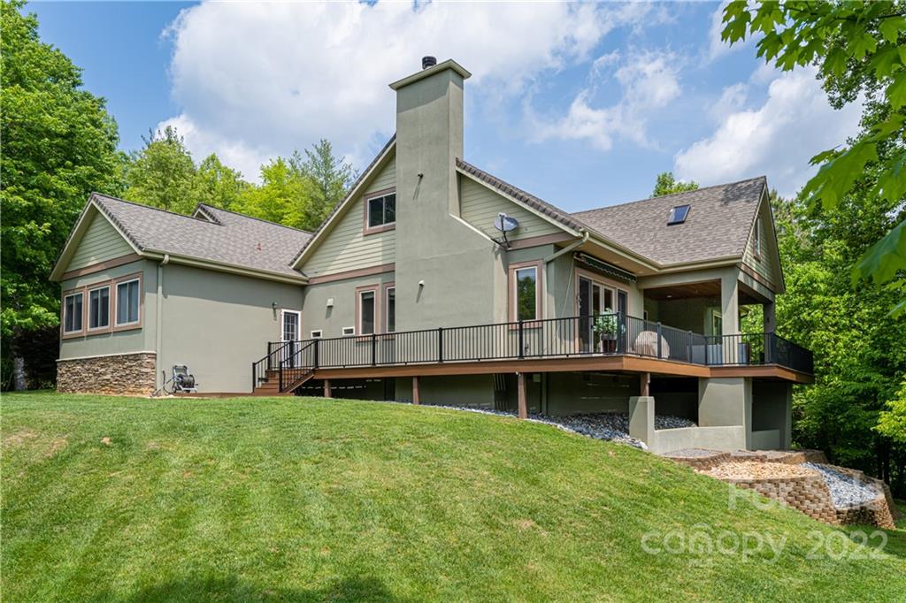 2391 Paint Fork Road Mars Hill, NC 28754 - Photo 8 of 45 a view of a house with a yard and sitting area