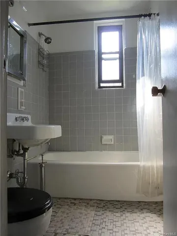 a bathroom with a sink and a bathtub